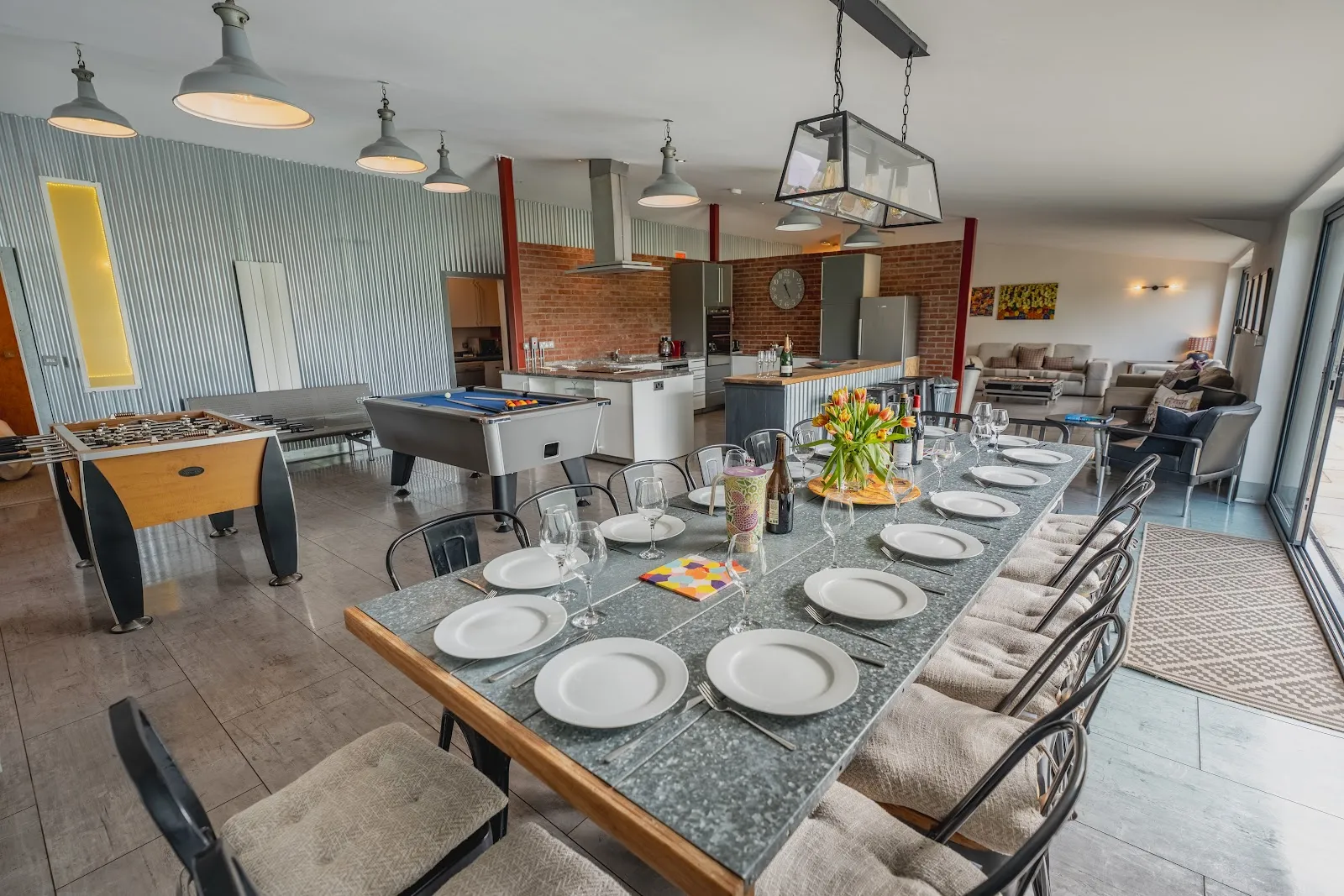 The dining table at The Pictureworks: one table that seats the whole group of up to 22 guests together indoors